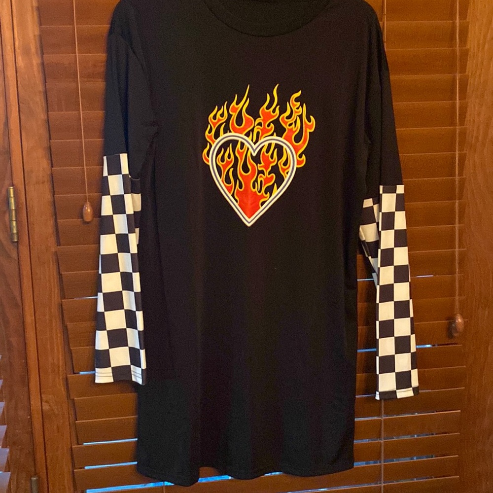 Polyester heart shirt with checkered sleeve. Could be worn as a dress